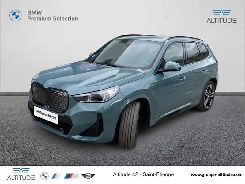 Vert Utilisé 2024 BMW iX1 M Sport SUV | 43 999 € (Prix juste) - Image 1/4