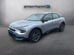 Gris Utilisé 2024 Citroën e-C4 Feel Berline | 23 980 € (Prix juste)