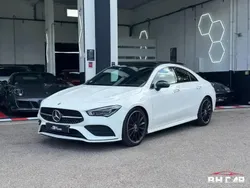 Blanc Utilisé 2021 Mercedes CLA200 AMG line Coupé | 35 990 € (Prix assez cher)