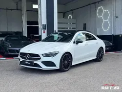 Blanc Utilisé 2021 Mercedes CLA200 AMG line Coupé | 35 990 € (Prix assez cher)