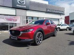 Rouge Nouvelle 2025 Mazda CX-30 Exclusive-Line SUV | 36 450 € (Prix juste)