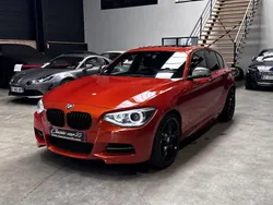 Orange Utilisé 2013 BMW M135 Citadine | 20 990 € (Prix assez cher)