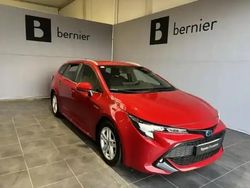 Rouge intense métallisé Utilisé 2021 Toyota Corolla Business Edition Break | 21 980 € (Prix juste)