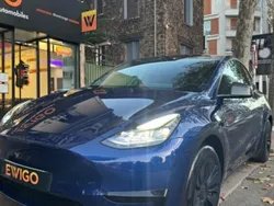 Bleu Utilisé 2023 Tesla Model Y Standard Range SUV | 33 990 € (Prix juste)