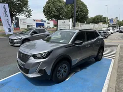 Gris Utilisé 2024 Peugeot e-2008 Style SUV | 28 590 € (Prix juste)