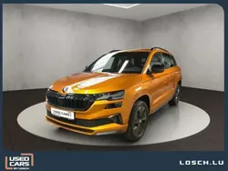 Orange Utilisé 2023 Skoda Karoq SportlinePlus SUV | 35 990 € (Prix juste)