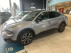 Gris Utilisé 2023 Citroën e-C4 Shine Berline | 23 990 € (Prix juste)