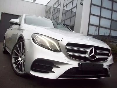 occasion Mercedes E220 D - AMG Line - pano opendak - met servicebook.