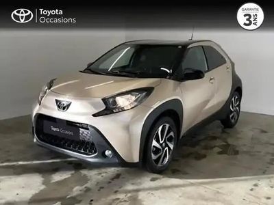 Biton beige gingembre métal/toit noir Occasion 2024 Toyota Aygo X Design SUV | 14 990 € (Prix juste)