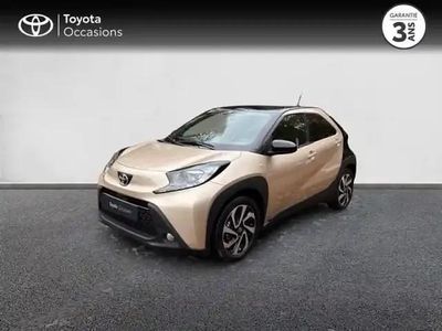 Biton beige gingembre métal/toit noir Occasion 2024 Toyota Aygo X Design SUV | 15 980 € (Prix juste)