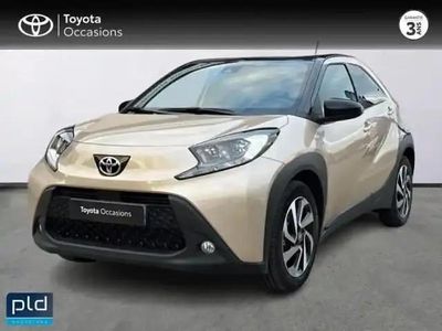 Biton beige gingembre métal/toit noir Occasion 2023 Toyota Aygo X Design SUV | 14 990 € (Prix juste)