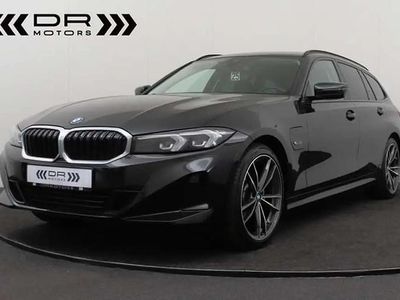 Noir Occasion 2022 BMW 320e Sport Line Break | 29 995 € (Prix juste)