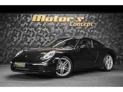 Noir Occasion 2012 Porsche 911 Carrera Coupé | 89 990 € (Prix juste)