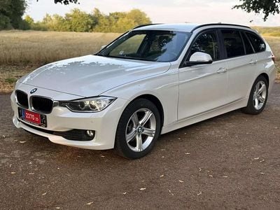 Noir Occasion 2015 BMW 318 Sport Line Break | 13 999 € (Prix juste)