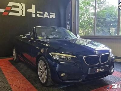 Bleu Occasion 2015 BMW 220 Cabriolet | 17 990 € (Prix juste)