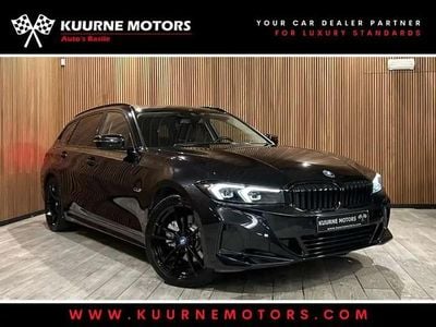 Noir Occasion 2023 BMW 320e Sport Line Break | 32 900 € (Prix juste)