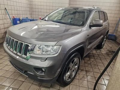 Gris Occasion 2011 Jeep Grand Cherokee Overland SUV | 15 900 €
