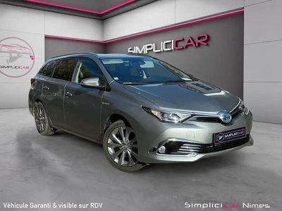 Blanc Occasion 2015 Toyota Auris Hybrid Business Edition Break | 14 480 € (Prix assez cher)