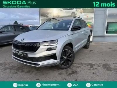 Gris argent métallisée Occasion 2022 Skoda Karoq SportLine SUV | 28 980 € (Prix juste)