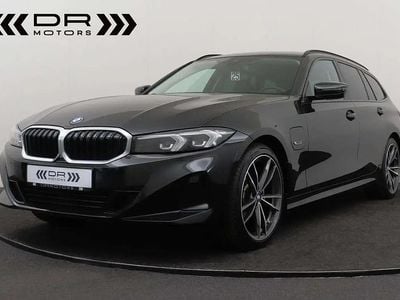 Noir Occasion 2022 BMW 320e Sport Line Break | 29 995 € (Prix juste)