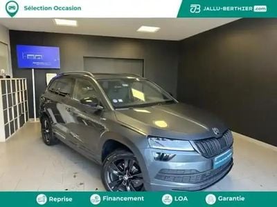 Gris perle Occasion 2021 Skoda Karoq SportLine SUV | 25 980 € (Prix juste)