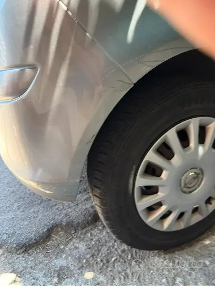 Usata Opel Corsa 65 CV (47 kW) 2012 Grigio Utilitaria