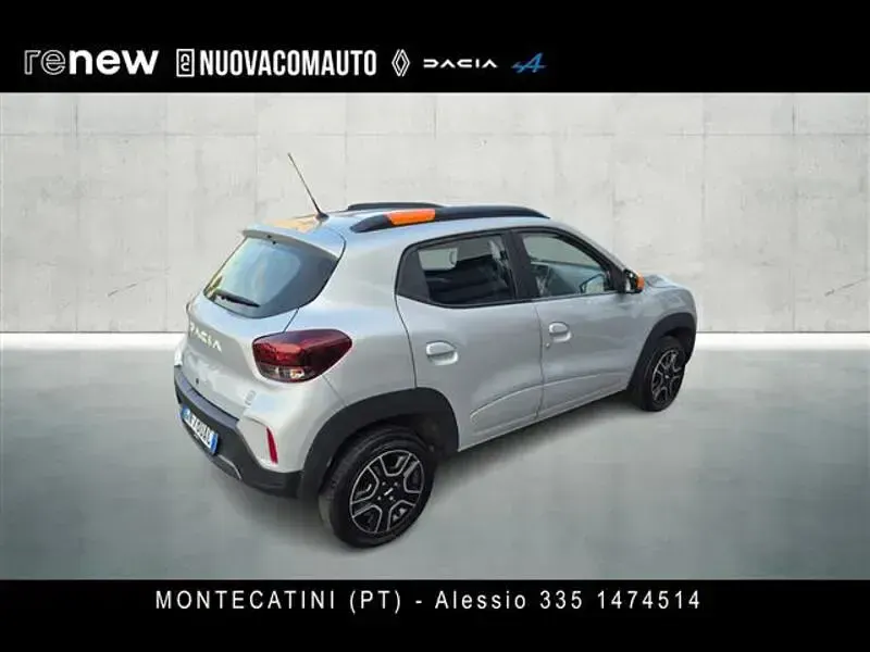 Usata Dacia Spring Comfort 33 kW (45 CV) 2023 Grigio chiaro Utilitaria