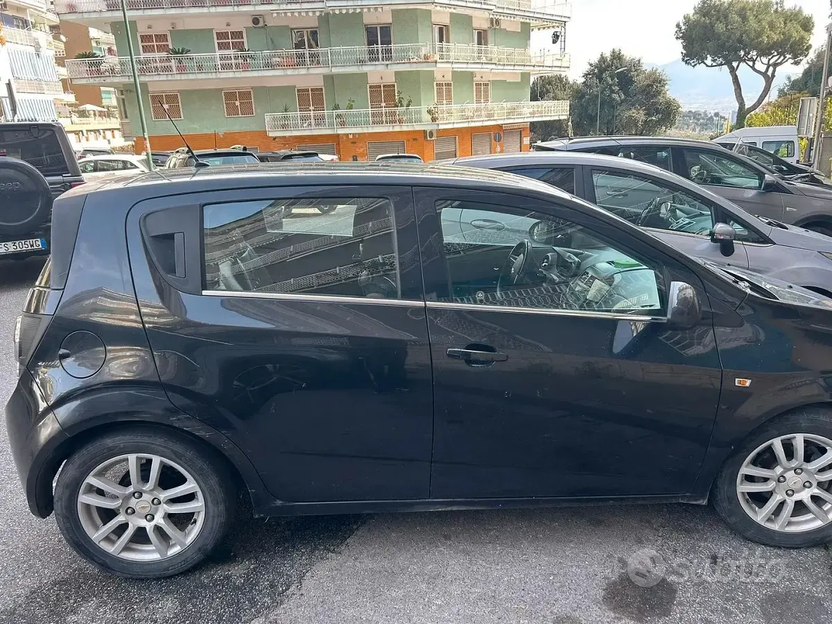 Usata Chevrolet Aveo 86 CV (63 kW) 2013 Nero Berlina