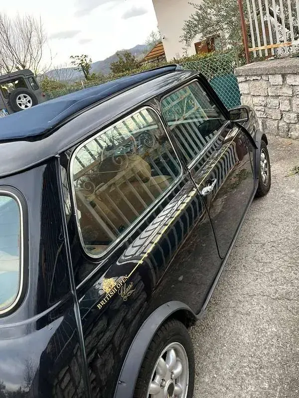 Usata Rover Mini 50 CV (36 kW) 1993 Nero Berlina