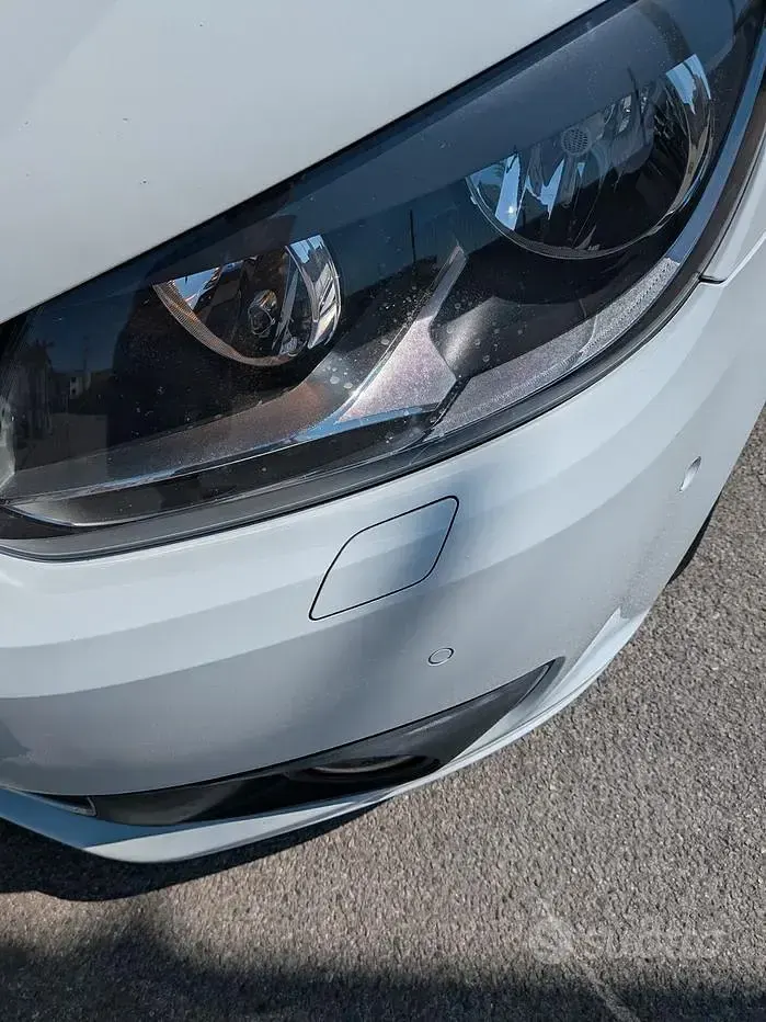 Usata VW Touran 105 CV (77 kW) 2014 Bianco Monovolume