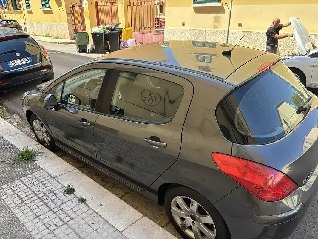 Usata Peugeot 308 Sportium 112 CV (82 kW) 2011 Grigio Berlina