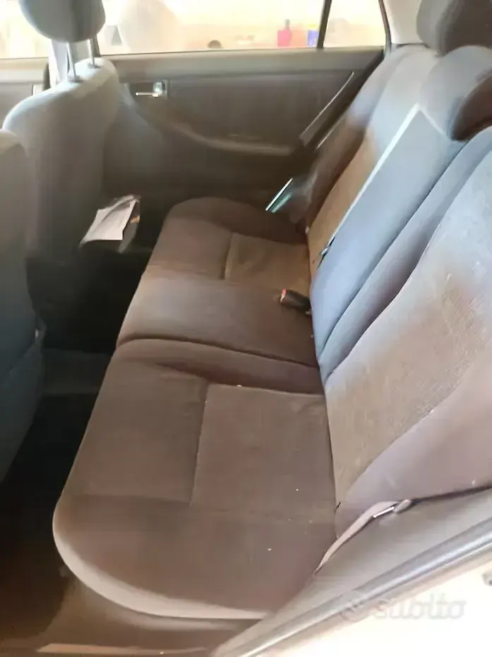 Usata Toyota Corolla 110 CV (80 kW) 2003 Bianco Berlina