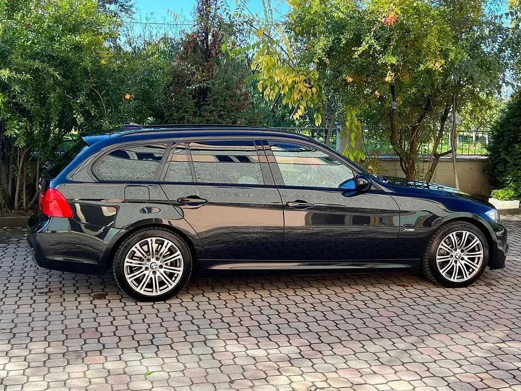 Begagnad BMW 330 M Sport 245 HK (180 kW) 2011 Svart Kombi