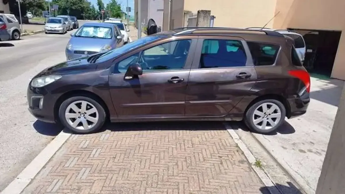 Usata Peugeot 308 SW 111 CV (81 kW) 2012 Marrone Station wagon