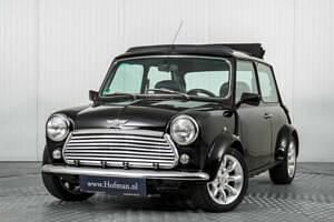 Begagnad Mini Cooper 58 HK (42 kW) 1998 Svart Halvkombi
