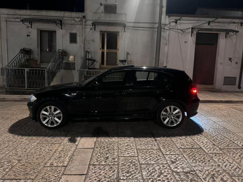 Usata BMW 120 177 CV (130 kW) 2010 Nero Utilitaria