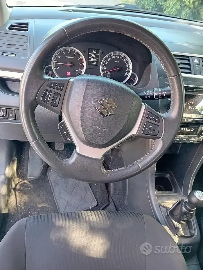Usata Suzuki Swift 94 CV (69 kW) 2012 Bianco Utilitaria