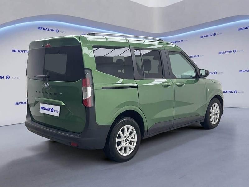 Käytetty Ford Tourneo Courier Titanium 125 HP (91 kW) 2024 Harmaa Tila-auto