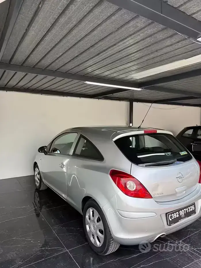 Usata Opel Corsa Club 86 CV (63 kW) 2011 Grigio Utilitaria