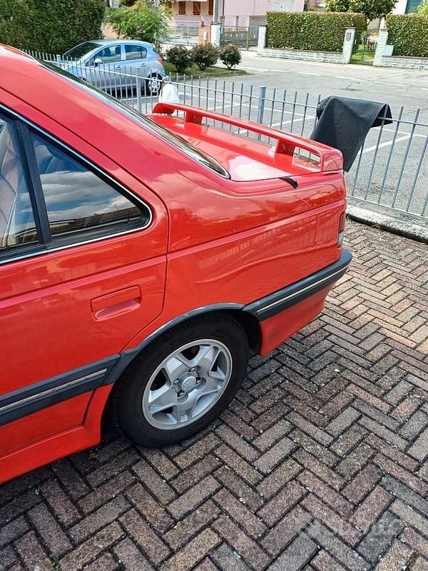 Begagnad Peugeot 405 147 HK (108 kW) 1990 Röd Sedan