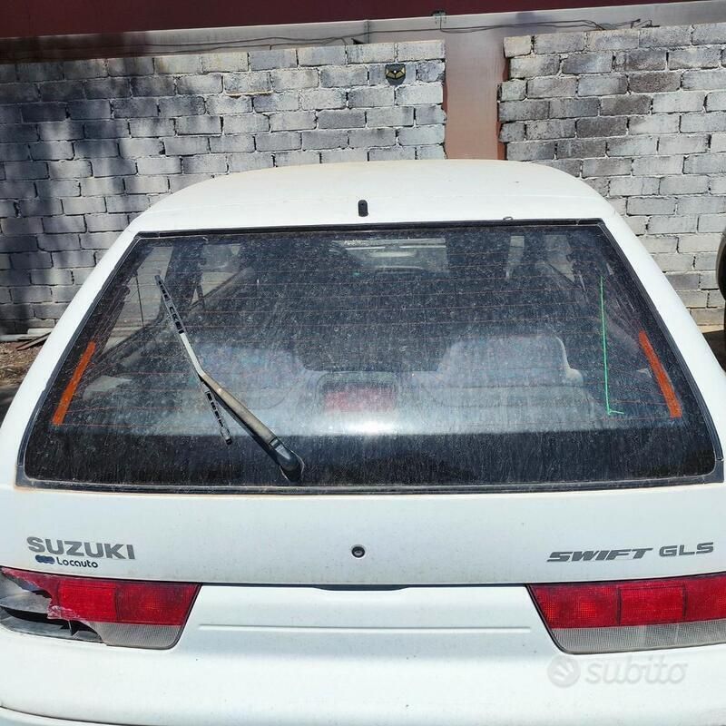 Usata Suzuki Swift 53 CV (38 kW) 1997 Bianco Utilitaria