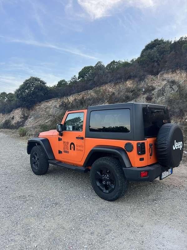 Arancione Usata 2014 Jeep Wrangler Sahara SUV | 27.000 € (Super prezzo) - Immagine 1/4