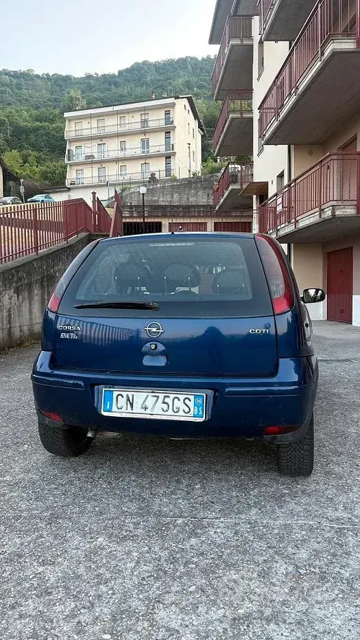 Używany Opel Corsa 69 KM (50 kW) 2004 Niebieski Hatchback