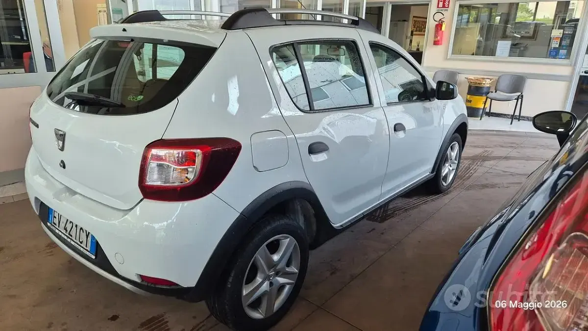 Gebraucht Dacia Sandero Prestige 90 PS (66 kW) 2014 Weiß Kombi