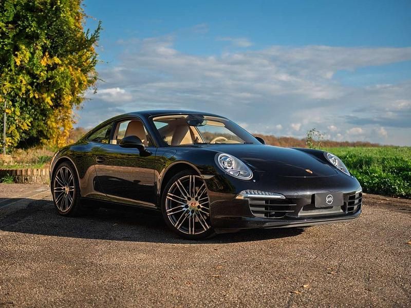 Nero basalto met Usata 2012 Porsche 911 Carrera Sport Coupé | 87.991 € (Buon prezzo) - Immagine 1/4