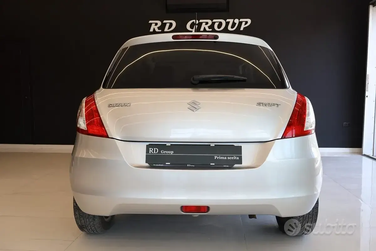 Usado Suzuki Swift GL 75 CV (55 kW) 2012 Gris Utilitario