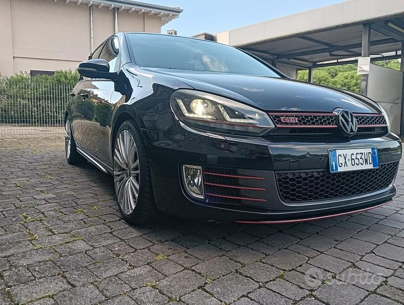 Second-hand VW Golf VII GTI 210 CP (154 kW) 2012 Negru Berlinǎ