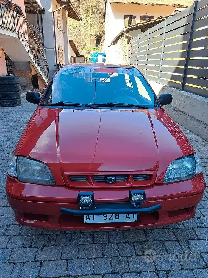 Usata Subaru Justy 68 CV (50 kW) 1997 Rosso Utilitaria