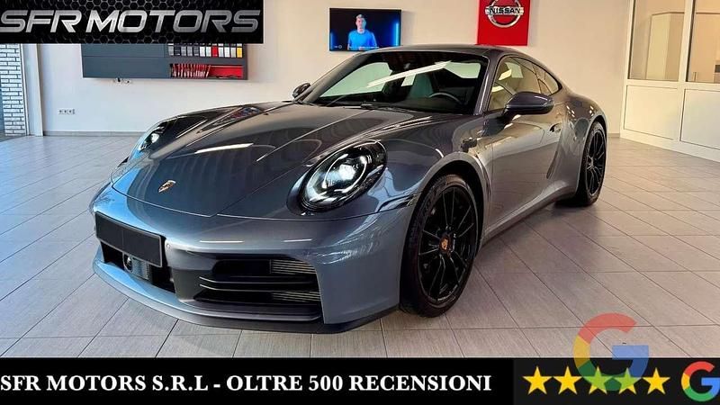 Grigio Usata 2024 Porsche 911 Carrera Coupé | 131.900 € (Molto cara) - Immagine 1/4