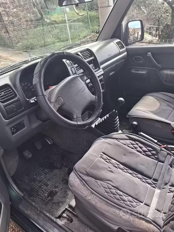 Second-hand Suzuki Jimny 80 CP (58 kW) 1999 Verde SUV
